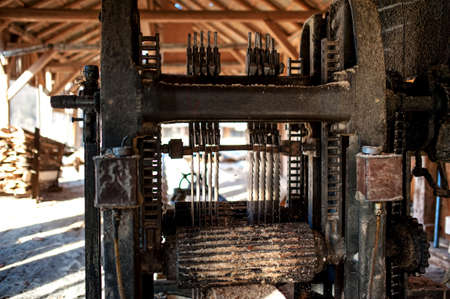Industrial wood factory - detail of industrial machinery cutting wood