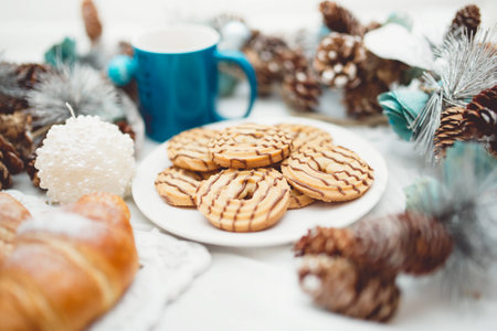 breakfast with croissants, cookies, milk and butterの写真素材