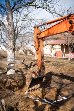 track-type loader excavator digging and leveling construction site