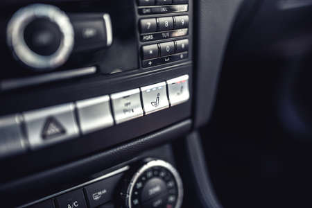 Modern car dashboard with seat ventilation and heating system. Modern details of electric carの写真素材