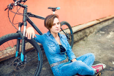 Fashion portrait of young beautiful brunette woman wearing stylish hipster summer sportive outfit,...