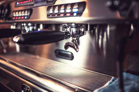 Automatic espresso machine waiting for coffee cups. Espresso machine at restaurant or pub.の写真素材