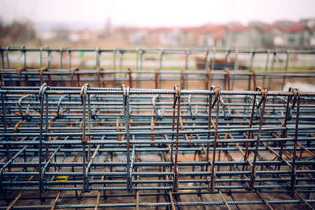 Reinforced heavy duty steel bars on construction site, infrastructure details and toolsの写真素材