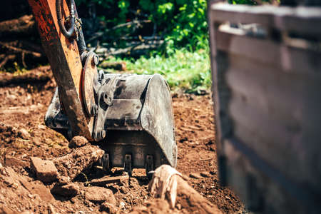 industrial excavator scoop, close-up of heavy machinery with metal bucketの写真素材