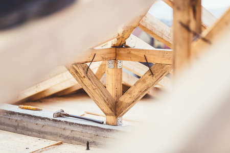 Details of construction site, close up of timber structure and roof systemの写真素材