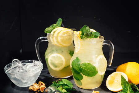 Fresh, organic lemonade drink with delicious lemons, lime and mint. Summer drink detailsの写真素材