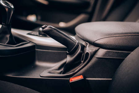 Interior modern car details - close up leather handbreak leverの写真素材