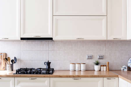 Interior kitchen design details - modern cabinets and wooden furnitureの写真素材