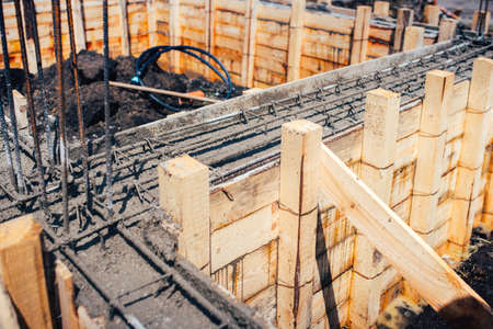 industrial details of house construction - development of new foundation with steel bars and...