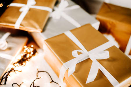 Christmas morning presents with holiday spirit. LIfestyle details, presents and gift boxes