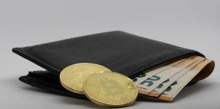 bitcoin on an euro walletの写真素材
