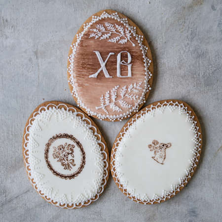 Happy family holiday, gingerbread easter cookies in form eggs in retro style. Festive cookies on...