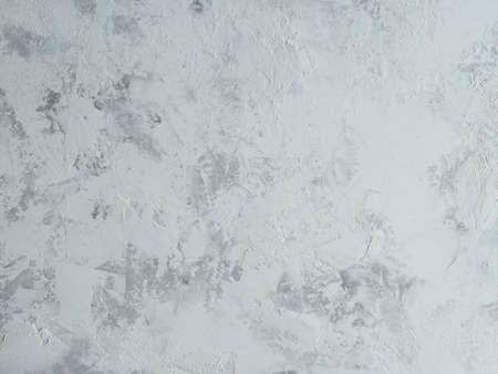 White painted texture with brush and palette knife strokes for interesting and modern backgroundsの写真素材