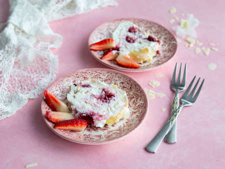 Merengo strawberry diet roll on pink background. Tea drinking. Healthy food, no sugar, no wheat flour. Top view, close up. Copy space.の写真素材