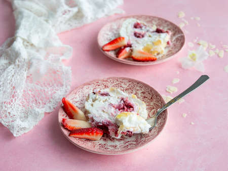 Merengo strawberry diet roll on pink background. Tea drinking. Healthy food, no sugar, no wheat flour. Top view, close up. Copy space.の写真素材