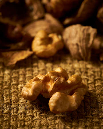 Walnuts on hemp bag. Warm and calm atmosphere.の写真素材