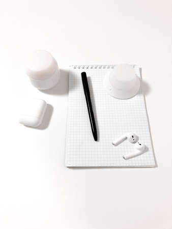 Notepad on a white table.の写真素材