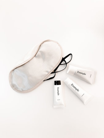 Beautiful tubes on a beautiful white table. No labels. For cosmetics.の写真素材