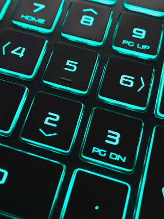 A Beautiful blue backlit keyboard.の写真素材