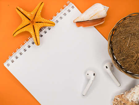 White notepad with no text. Empty space for text. Beautiful colors. Shells. Starfish. Beautiful...