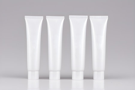 Jars and tubes of cosmetics, clean design for advertising, light background for cutting out objects without inscriptions and any textの写真素材