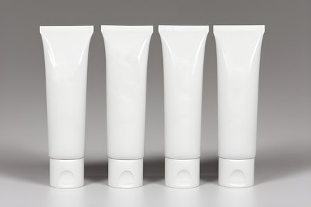 Jars and tubes of cosmetics, clean design for advertising, light background for cutting out objects without inscriptions and any textの写真素材