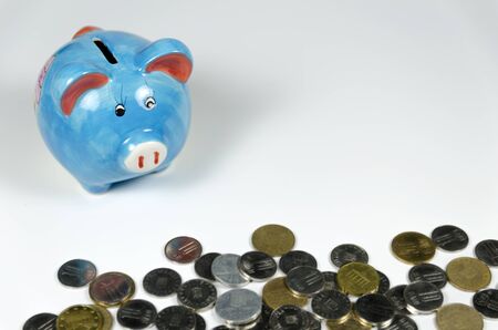 Piggybank and coinsの写真素材