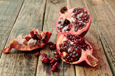 Granate fruit on wooden tableの写真素材