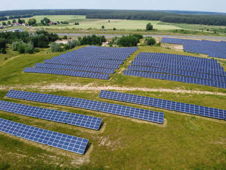 Blue solar panels. background of photovoltaic modules for renewable energy. Aerial view of Solar...