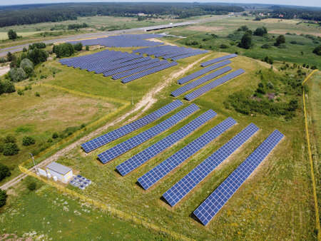Solar panels on field in summer, aerial view, Poland