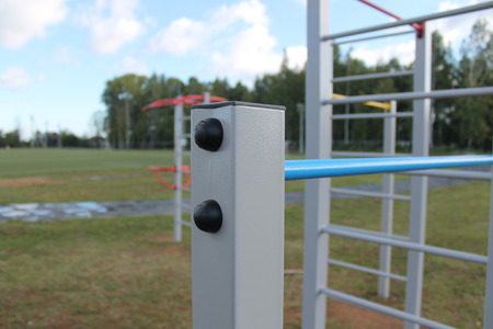 Sports equipment, running track, bleachers, football field