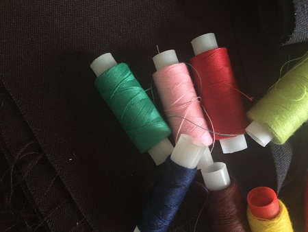 Fabric samples and threadの写真素材