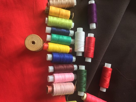 Fabric samples and threadの写真素材