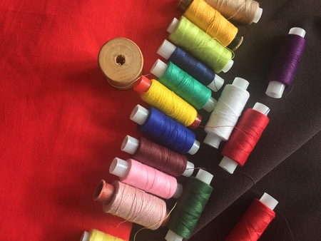 Fabric samples and threadの写真素材