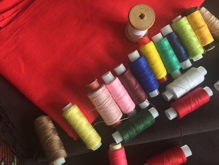 Fabric samples and threadの写真素材