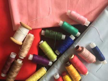 Fabric samples and threadの写真素材