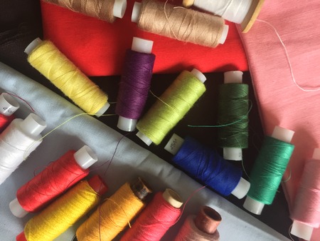 Fabric samples and threadの写真素材