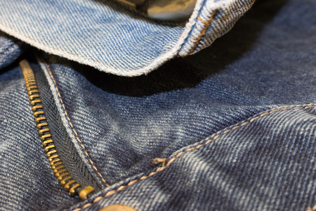different parts of old jeans background or textureの写真素材