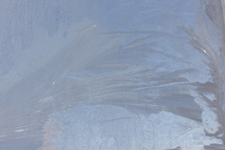 stains of frozen water vapor on the windowの写真素材
