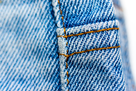 different parts of old jeans background or textureの写真素材