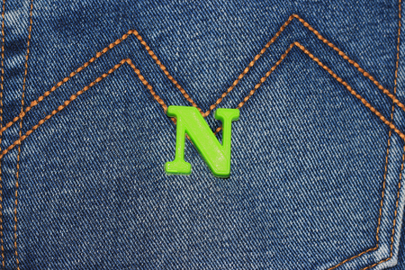 different parts of old jeans background or textureの写真素材