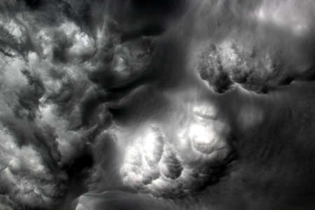 Dark ominous grey storm clouds. Dramatic sky.