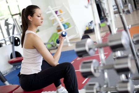Young woman in the gymの写真素材