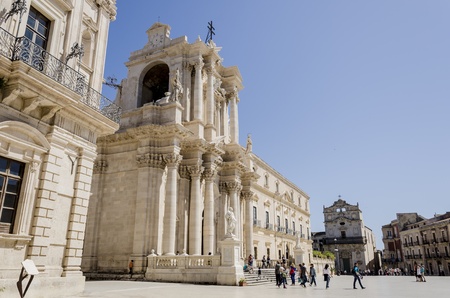 Syracuse, Italy, April 30, 2012, People in front of Syracuse cathedral. The cathedral (Italian: Duomo) was built by bishop Zosimo inthe 7th century over the great Temple of Athena.のeditorial素材