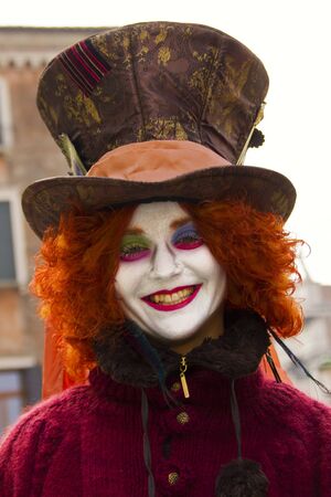 Venice, Italy, February 9, 2013: Unidentified person with traditional Venetian carnival mask in Venice, Italy at February 10, 2013. At 2013 it is held from January 26th to February 12th.のeditorial素材