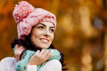 Young woman in the autumn forestの写真素材