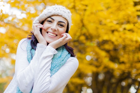 Young woman in the autumn forestの写真素材