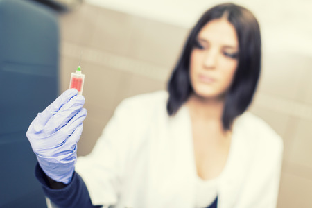 Young woman in the medical laboratory