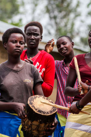 Unidentified women dancing in the UN Millenium village at January 6, 2012. It is a village of returnees who came back to Rwanda after the 1994 genocide.のeditorial素材