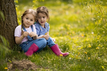 Cute little girls on the farmの写真素材